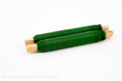 WIKKELDRAAD GROENGELAKTE OP STOK (0.70mm dikte, 33M lang) 2 Stuks