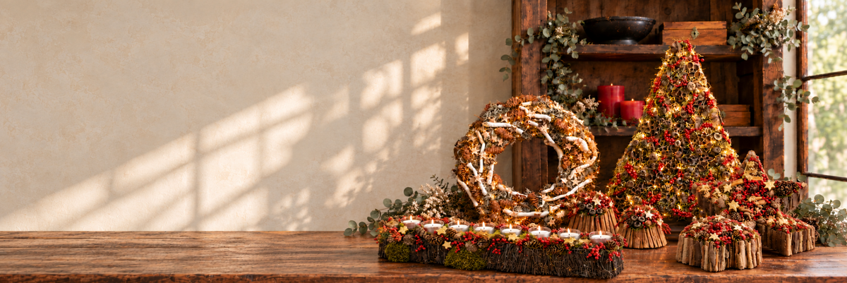 Bloemschikken voor kerst: materialen en bloemstukken